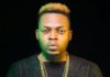 Olamide advises Nigerians on handling police brutality