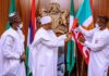 Buhari Presents APC flags to Edo Guber Candidate Ize Iyamu